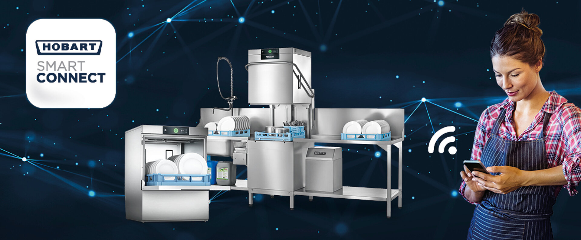 A selection of HOBART dishwashing machines, including a front‑loading and a hood‑type model, displayed with racks of dishes and stainless steel work areas, accompanied by a person using a smartphone and a HOBART SMART CONNECT logo on a digital network background.A selection of HOBART dishwashing machines, including a front‑loading and a hood‑type model, displayed with racks of dishes and stainless steel work areas, accompanied by a person using a smartphone and a HOBART SMART CONNECT logo on a digital network background.
